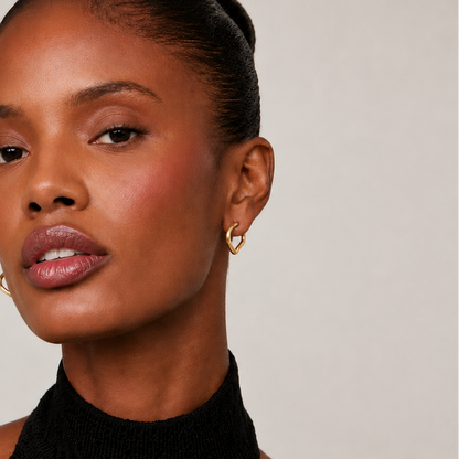 Gold Wave Huggie Earrings